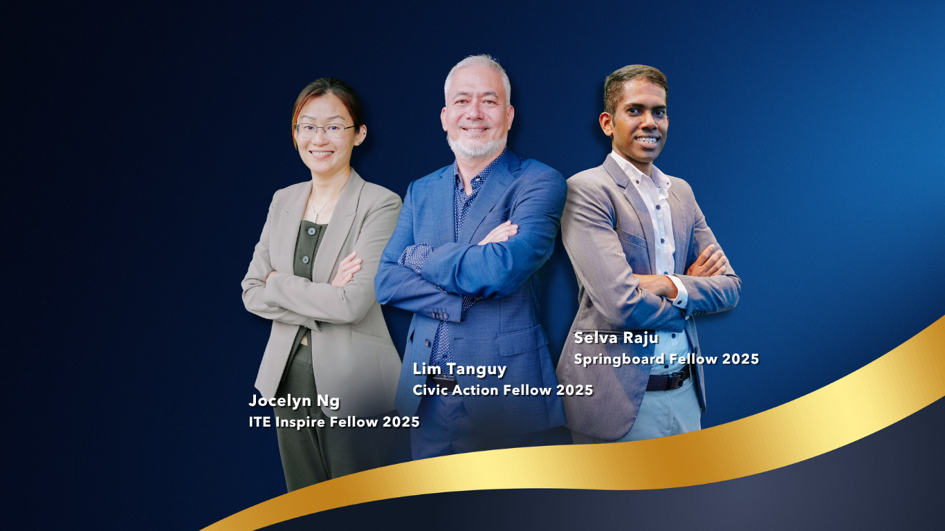 A man sitting at his desk feeling energised and inspired.